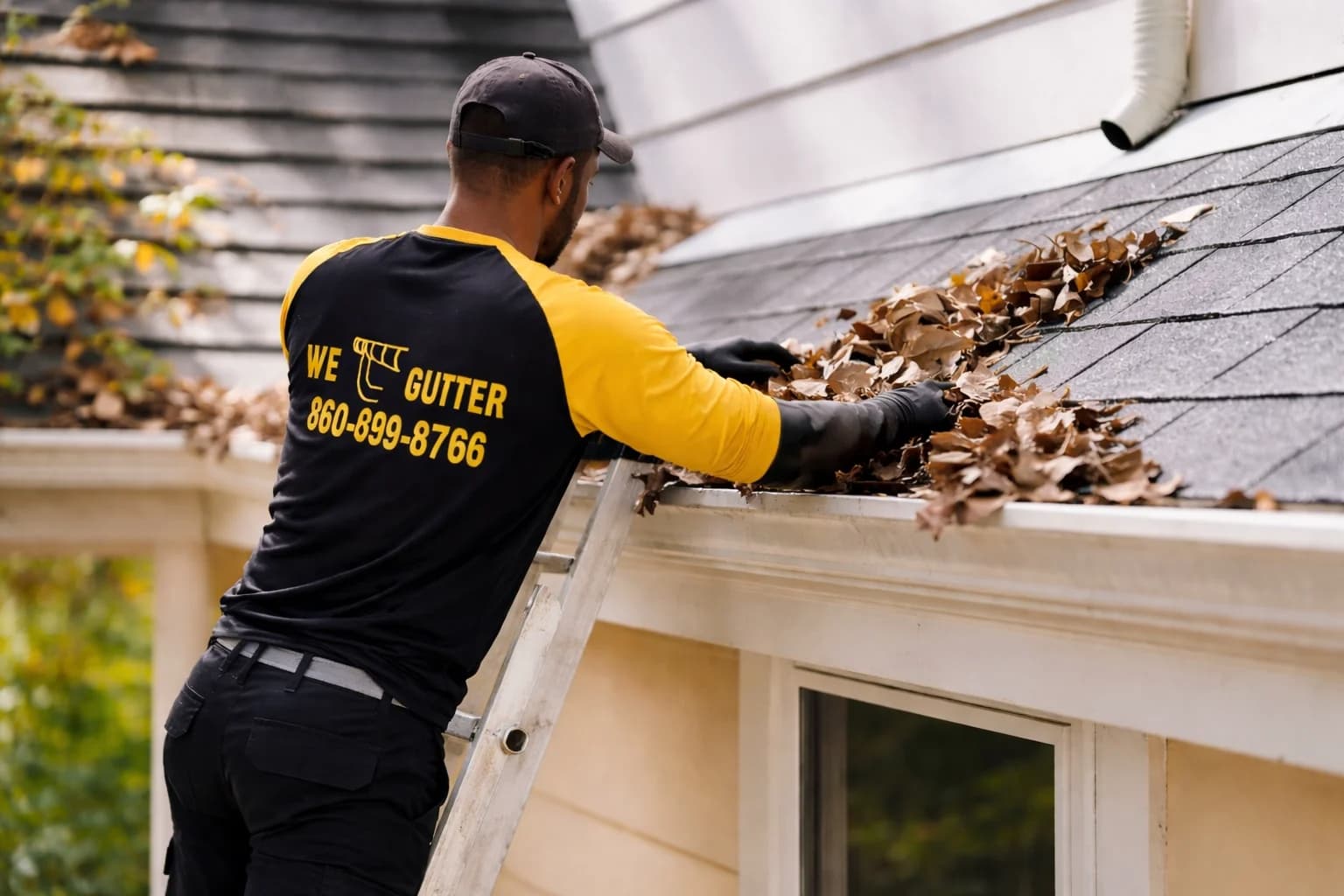 Rainwater flowing through a residential gutter system in Connecticut