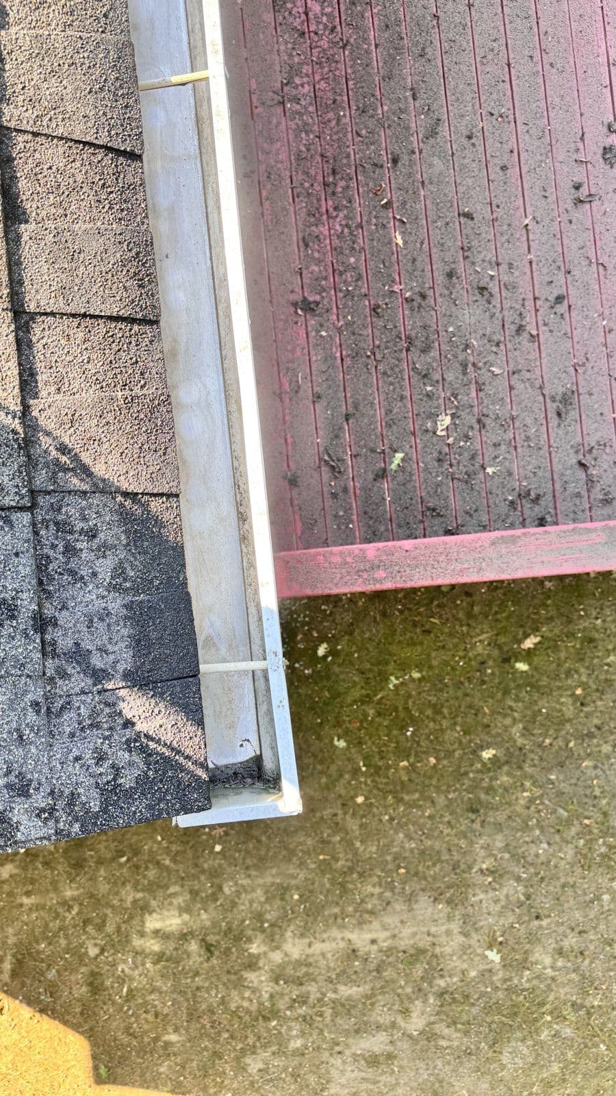 Oakville: A cleared end section of the same deck-side gutter run.