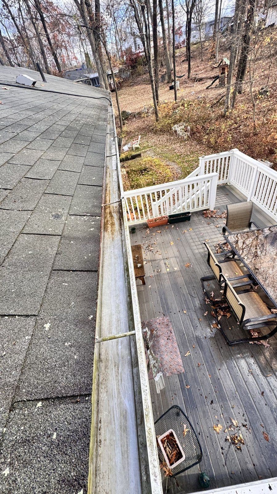 Prospect: The same deck-side gutter after accumulated leaves were removed.