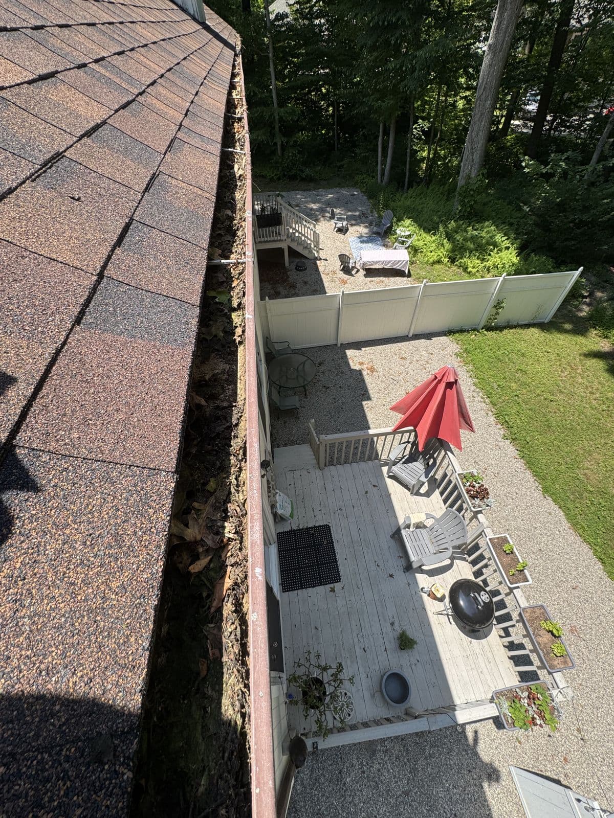 Wolcott: Leaves filling the gutter above the backyard deck.